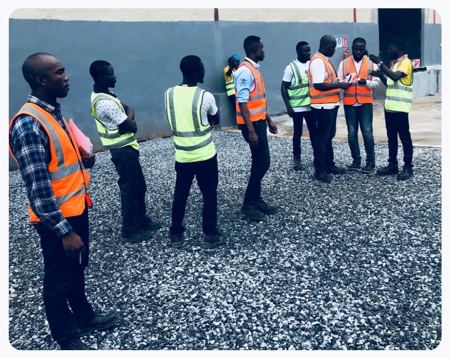Trade operations team in high-visibility vests