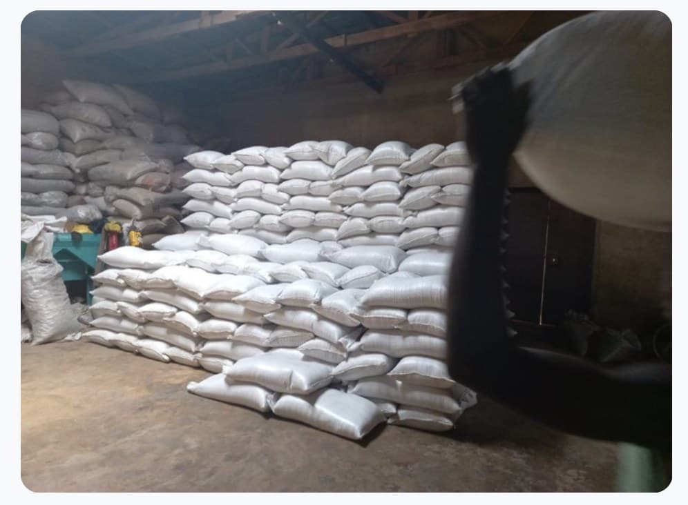 Stacked commodity sacks inside a warehouse